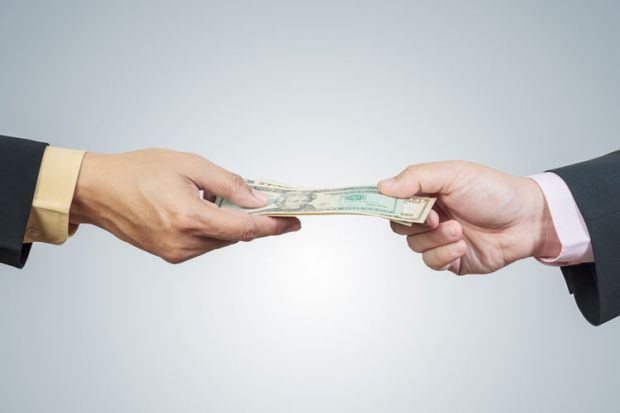 two-hands-exchanging-money.jpg