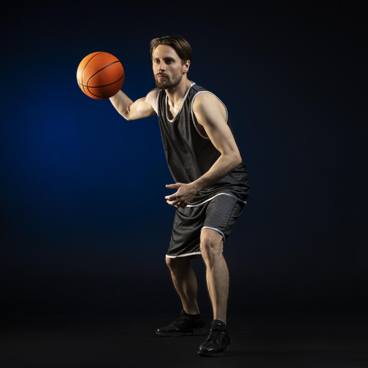 athletic-man-holding-basketball.jpg